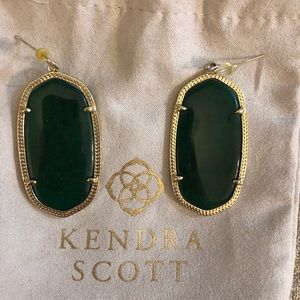 Kendra Scott Danielle earrings on deep green